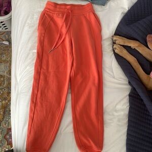 Orange lululemon fleece joggers